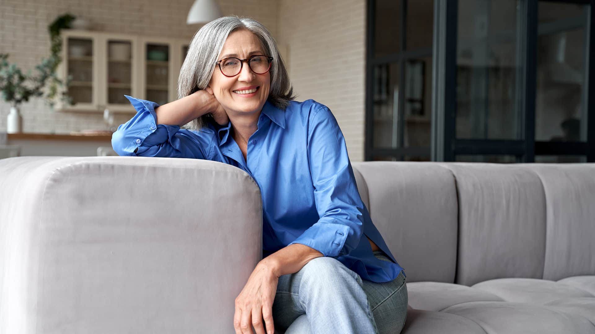 older woman happy she stopped trying to be liked by everyone