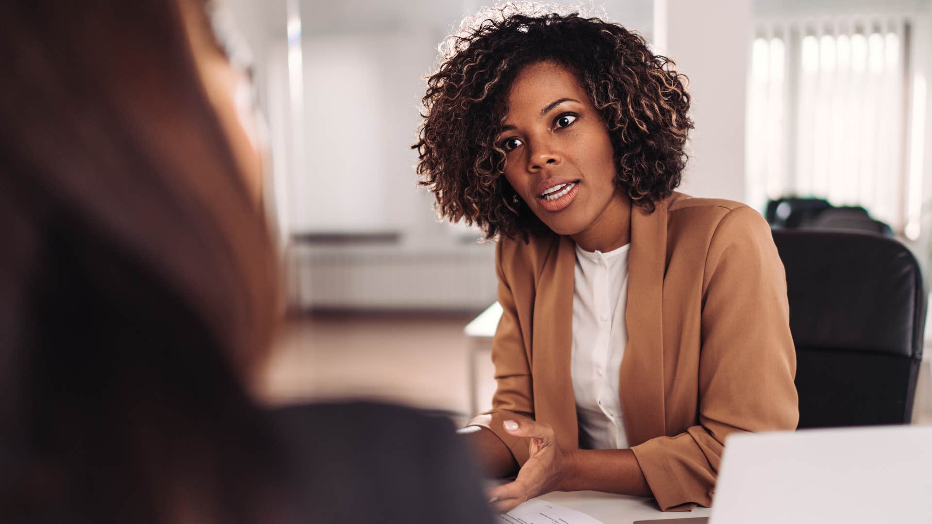 woman being direct when talking to co-worker