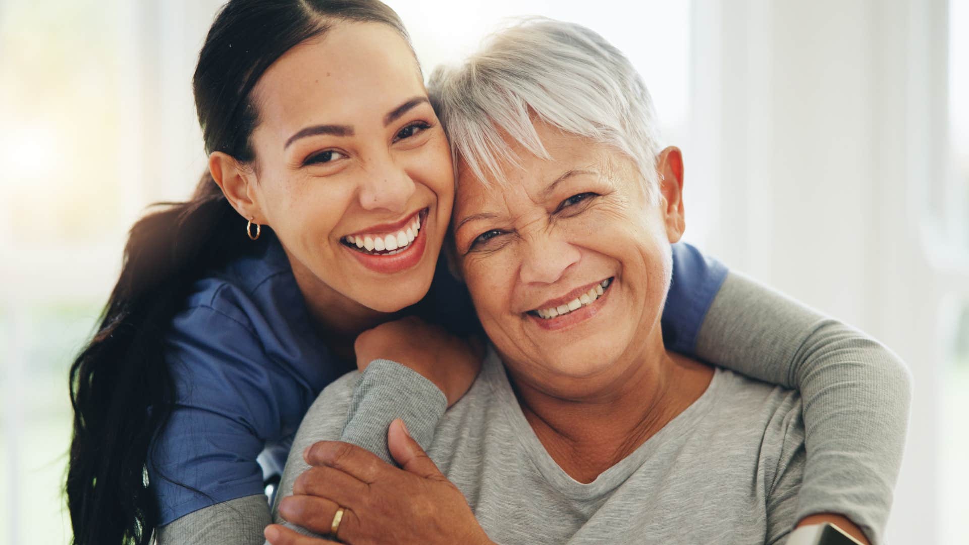 woman who doesn't need a partner hugging her daughter