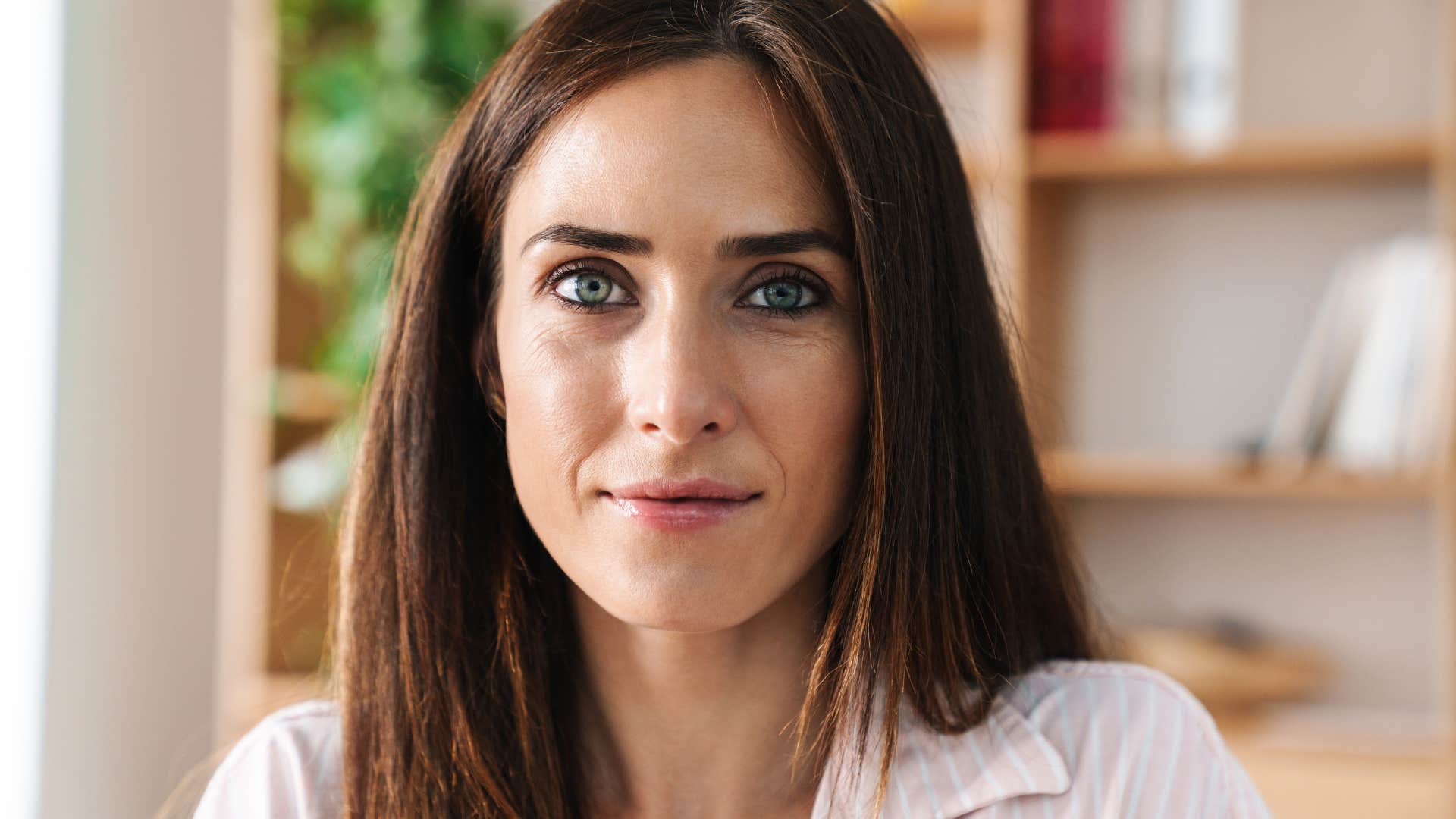 woman who has outgrown people-pleasing smiling