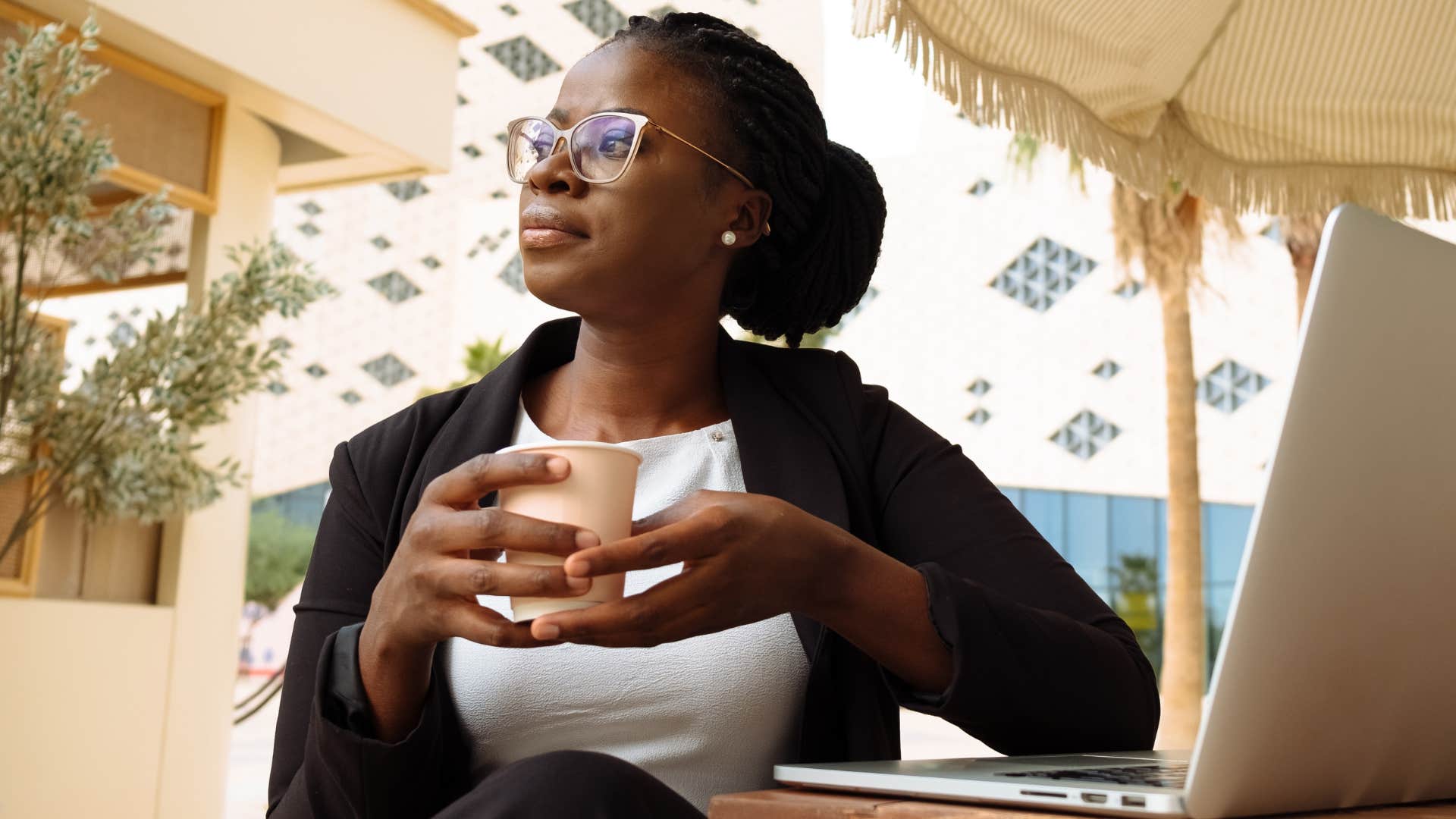 woman who doesn't feel pressured to explain herself drinking coffee