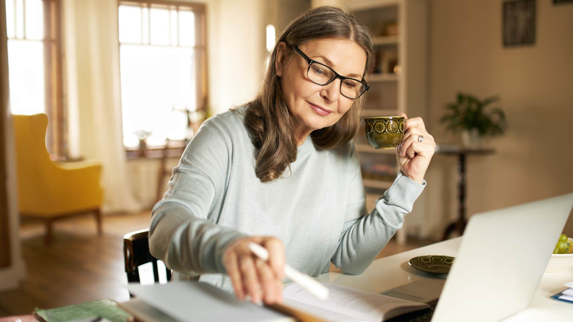 older woman who prefers solitude working at home