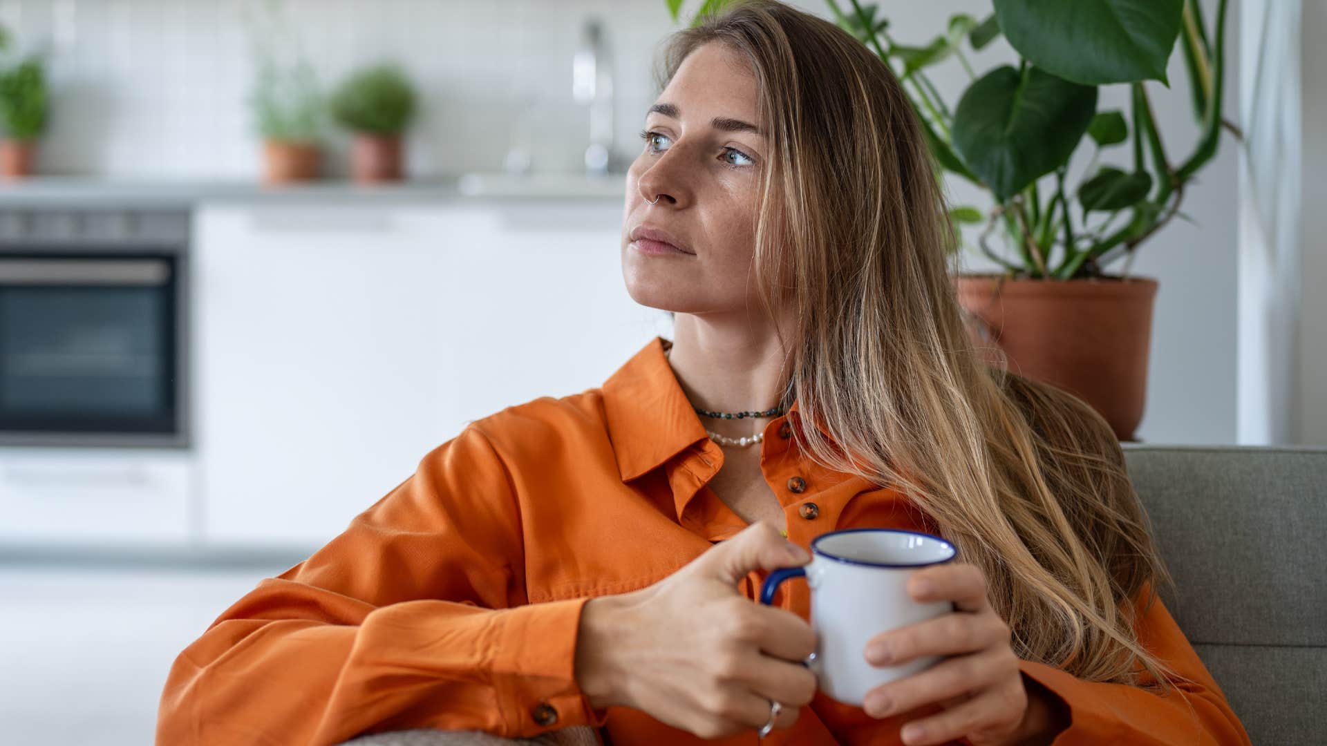 woman who trusts her gut drinking coffee