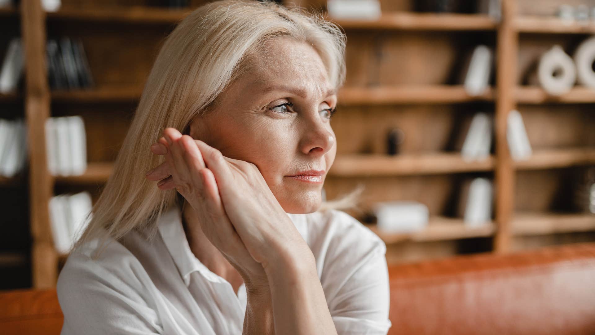 happy woman avoiding negativity sitting alone