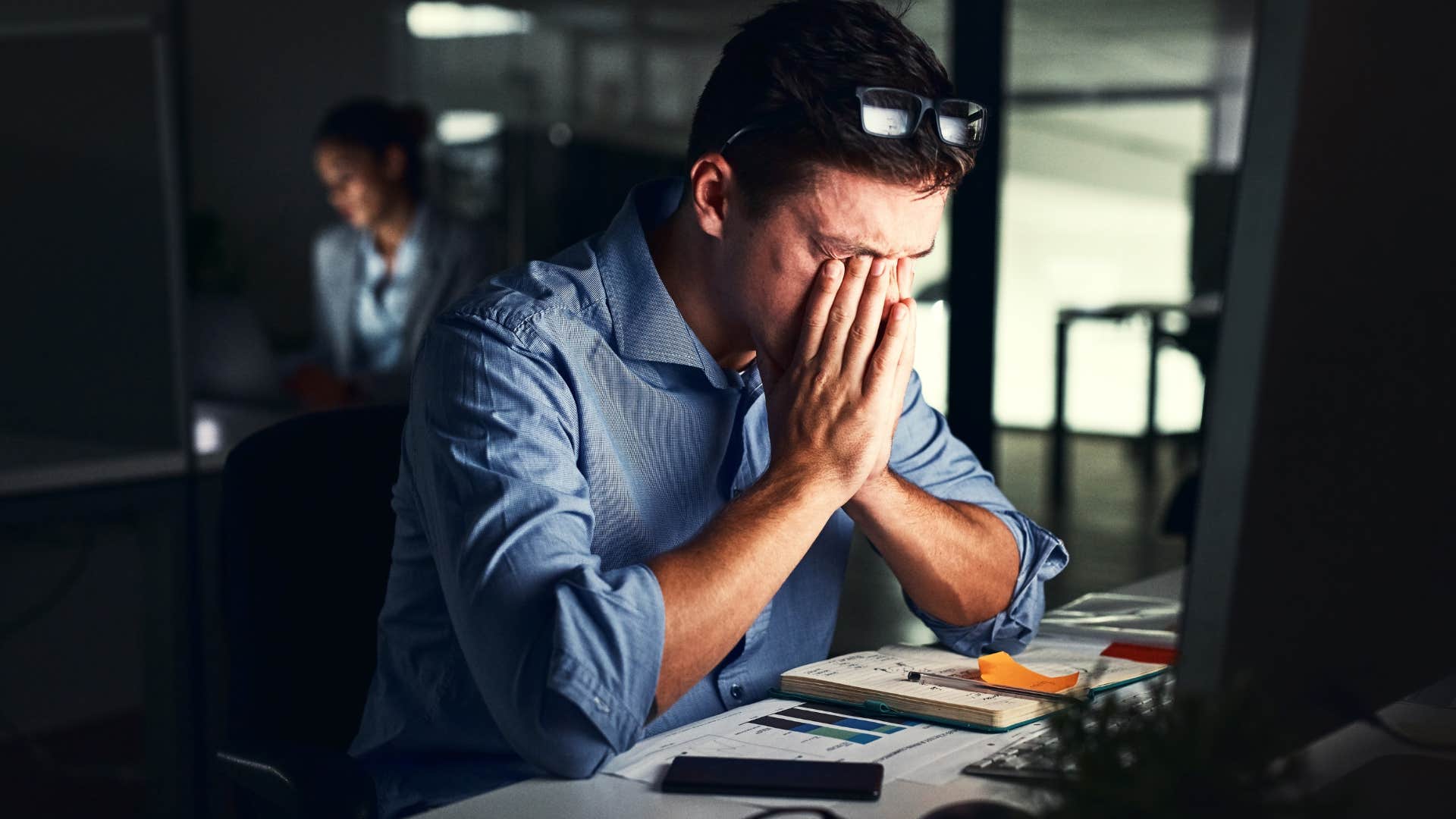 man with the work habit of it becoming a competition causing him to disconnect from others