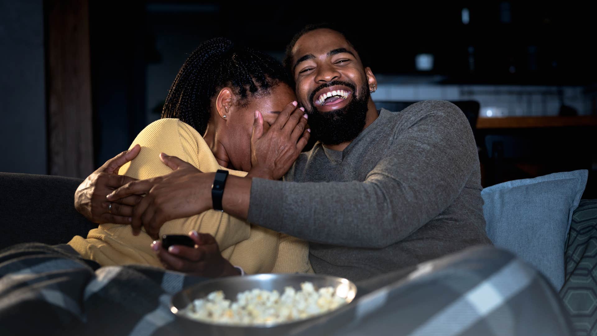 a couple stays up late to watch a horror movie