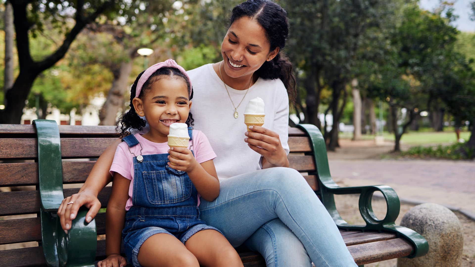 little girl and her mom enjoying sweet treats