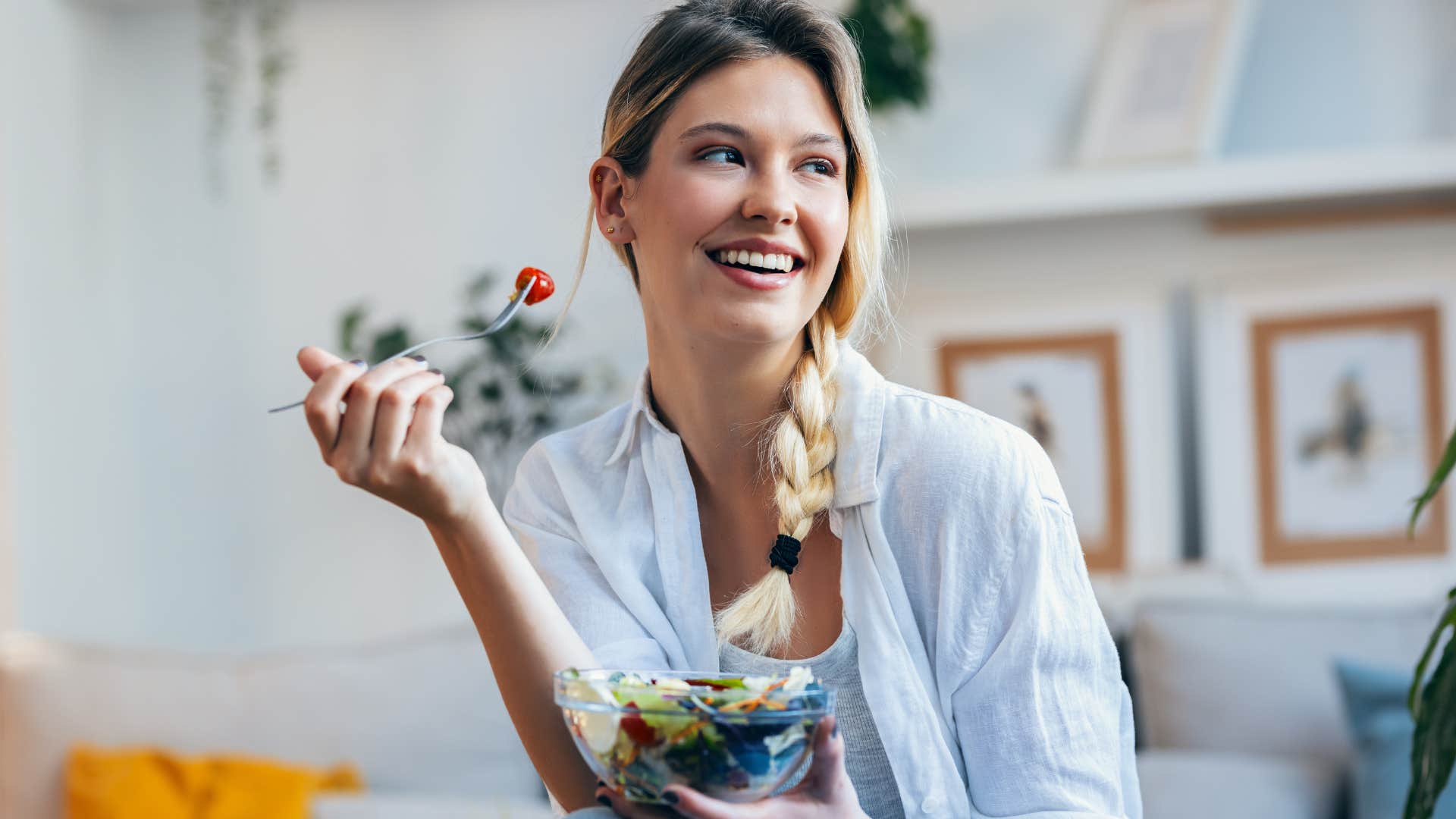 Woman smiling and not worrying about food at home.