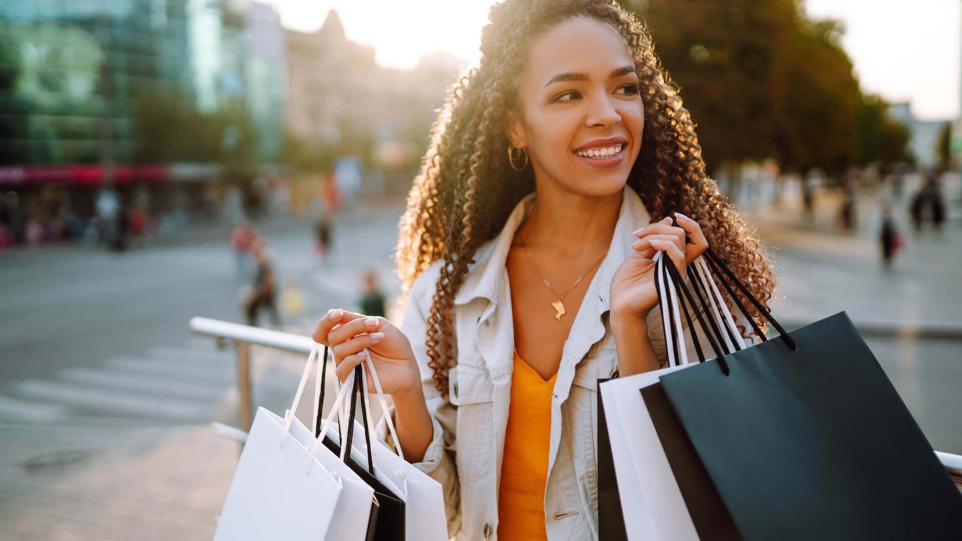 woman carrying shopping bags