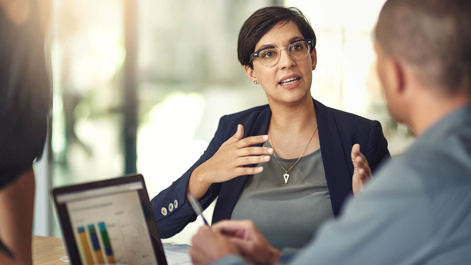 woman saying it is what it is in a work meeting