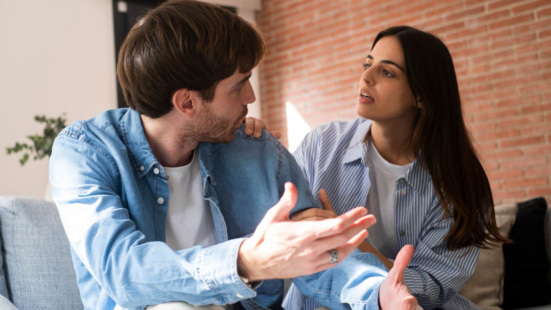 man saying it's just a joke to his upset offended wife
