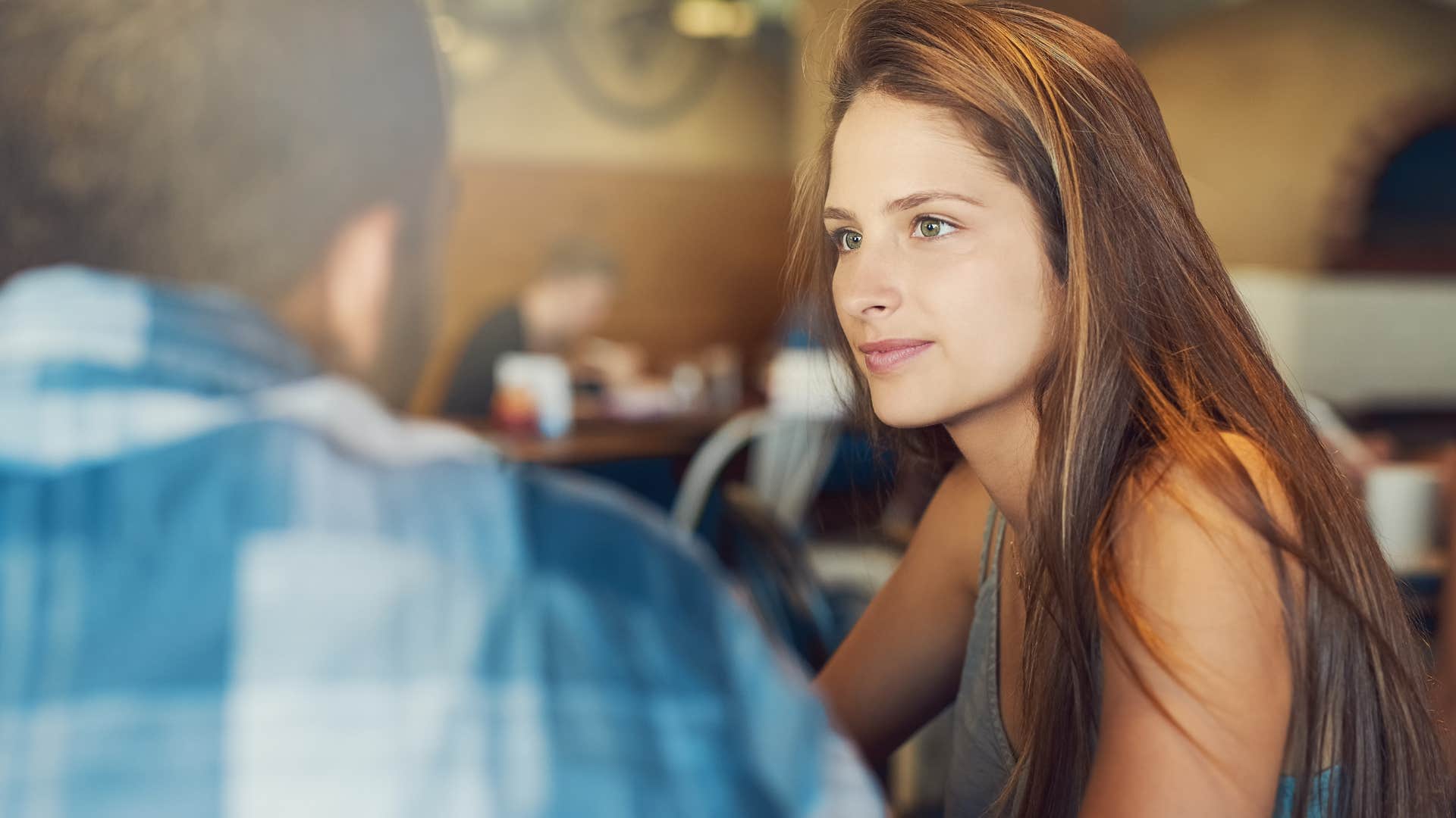 woman saying I manifested it to uninterested man