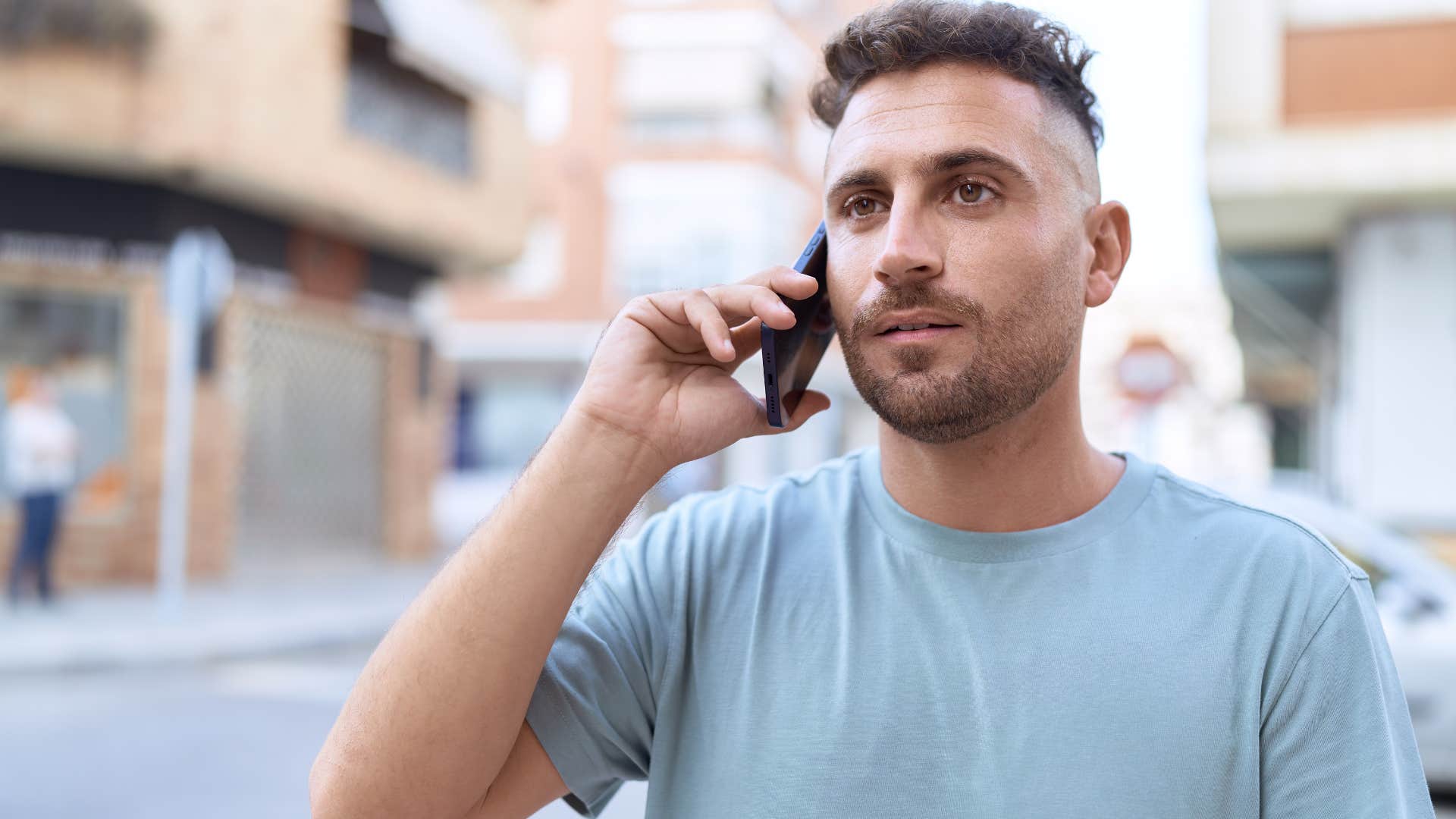 man saying you only live once on the phone