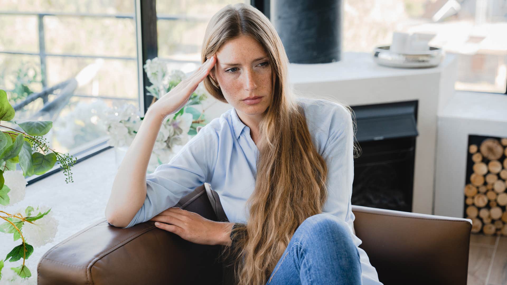 sad woman thinking about upbringing with narcissistic mom