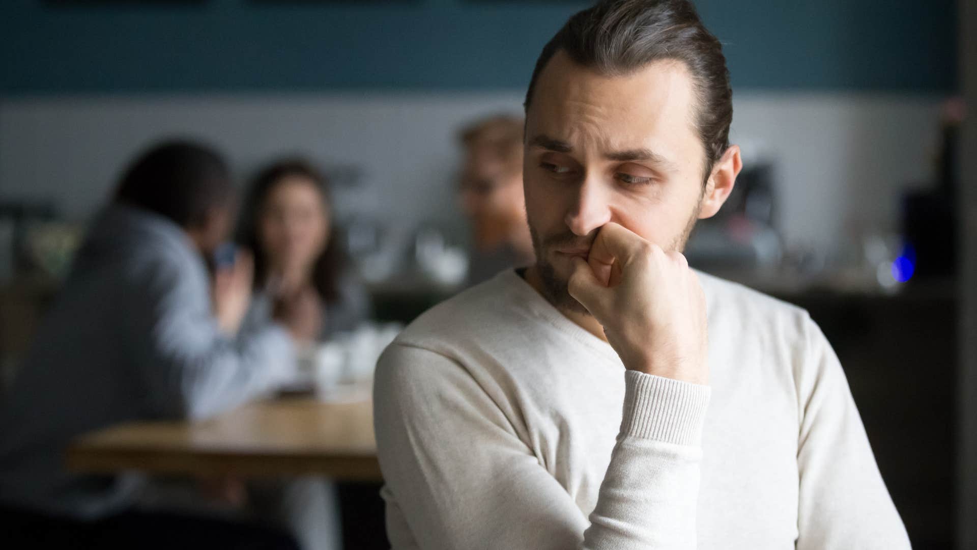 Man saying "I'll leave you alone" next to a group of people.