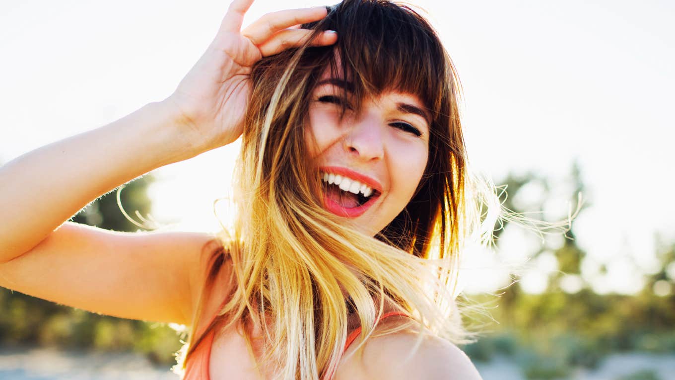 Things Shiny, Happy People Do That Unhappy People Don't Shiny happy woman.