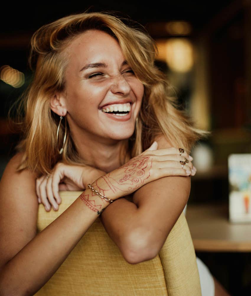 Manipulative woman using charm to overwhelm