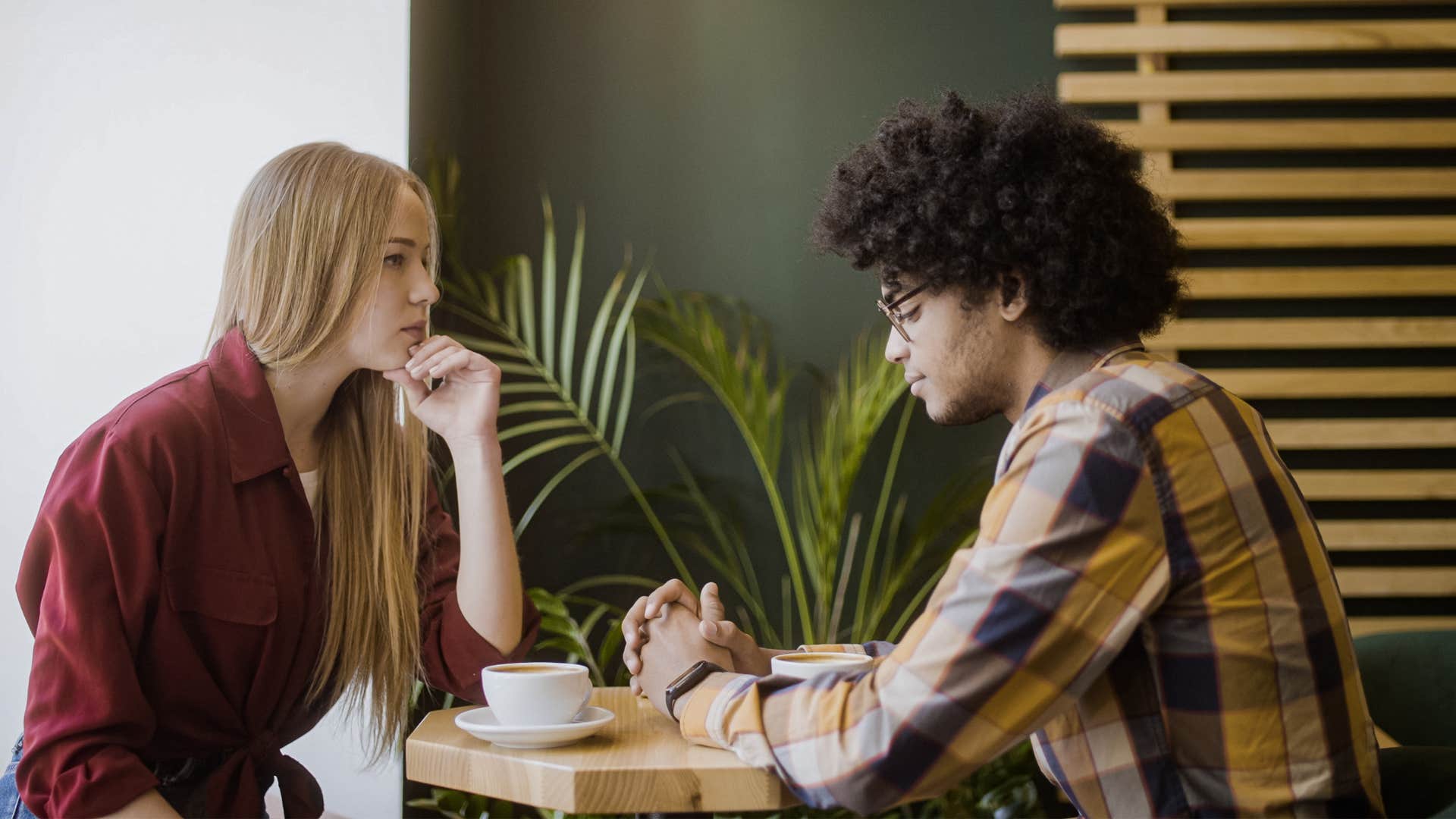 a woman questions her boyfriends distance away from her