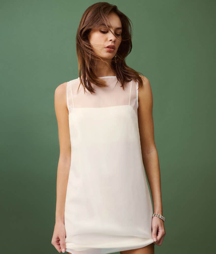 Woman in white dress.