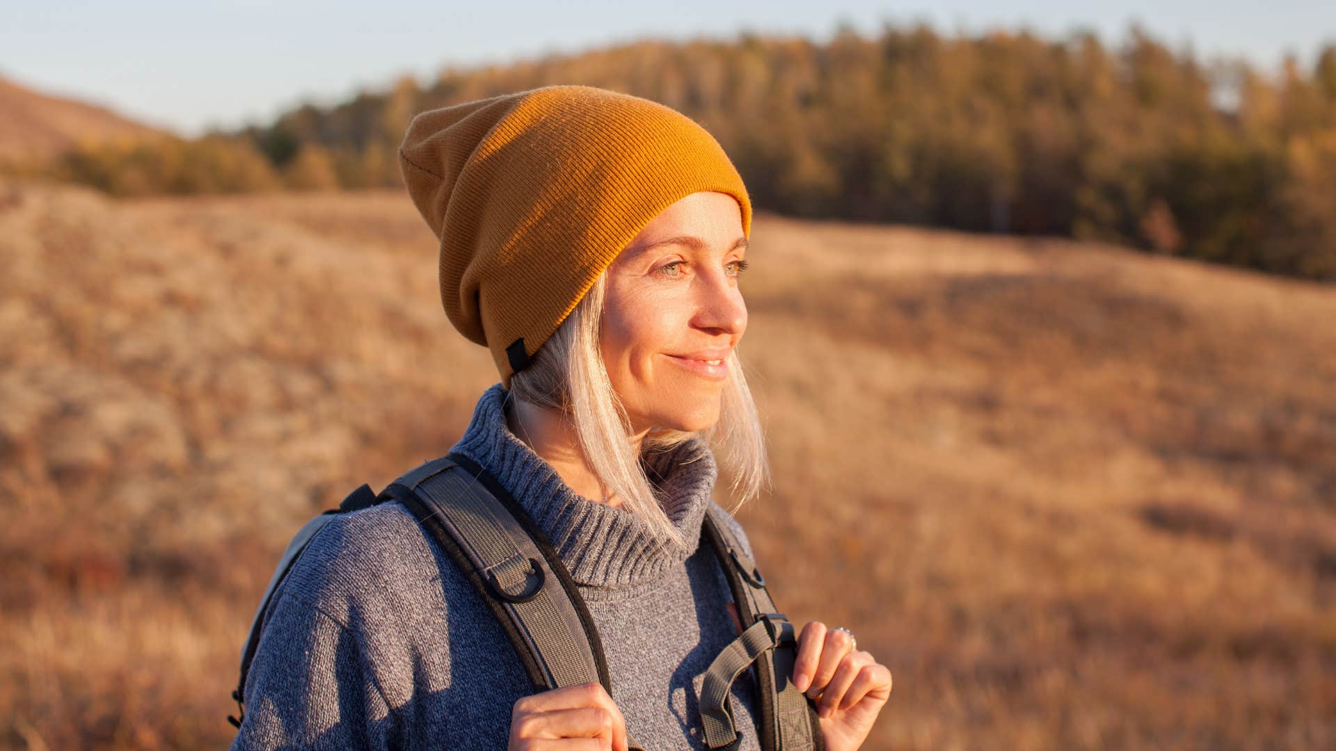 happy woman hiking in nature