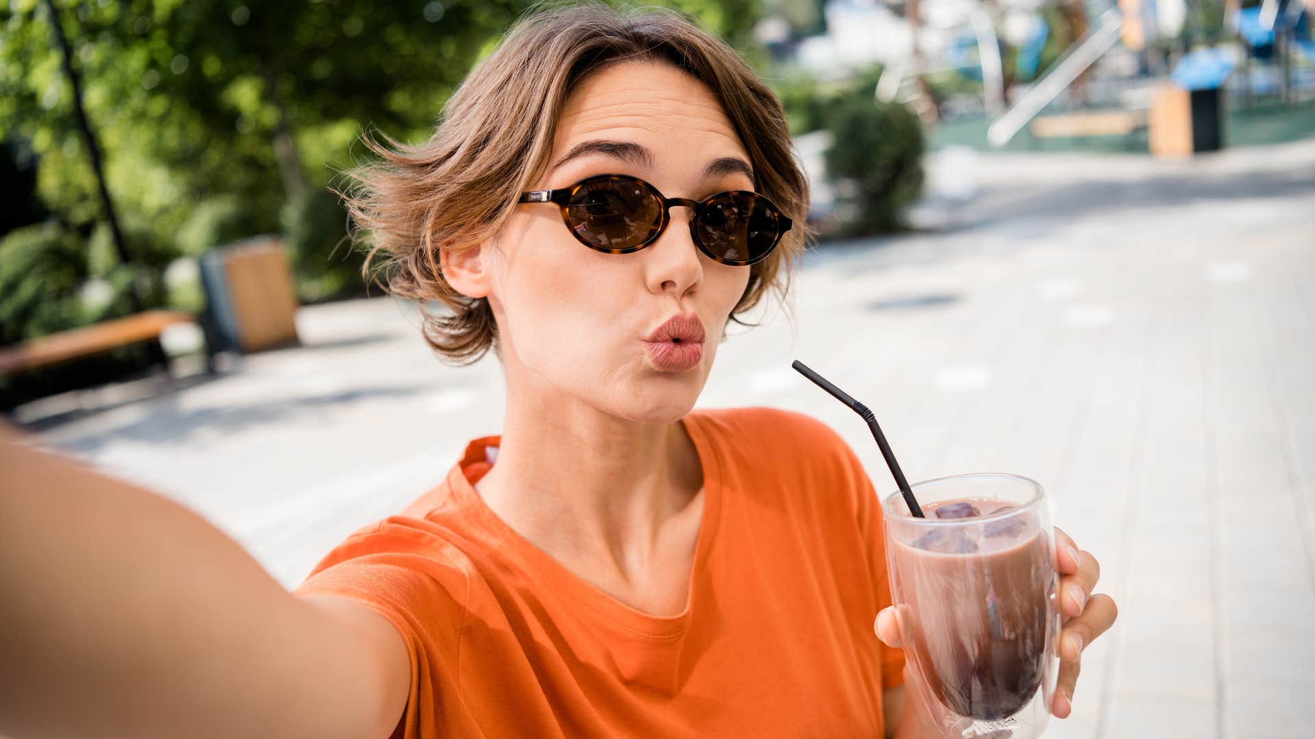 happy woman being silly to make herself smile
