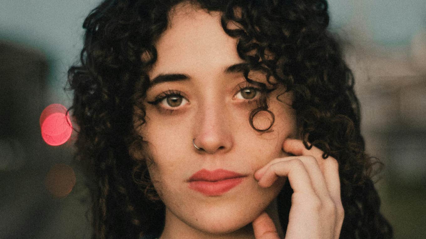 Woman breaking free from Gen-Z dead-eye stare.