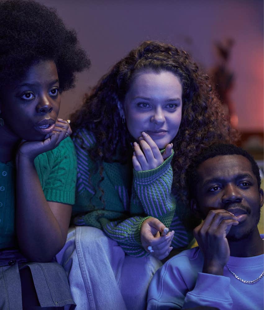 Friends watch movie at home as a way to save money and still spend time with friends