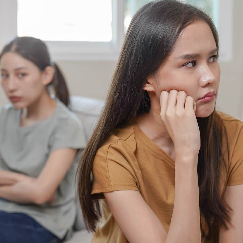 woman who is a toxic friend as other woman makes excuses for her