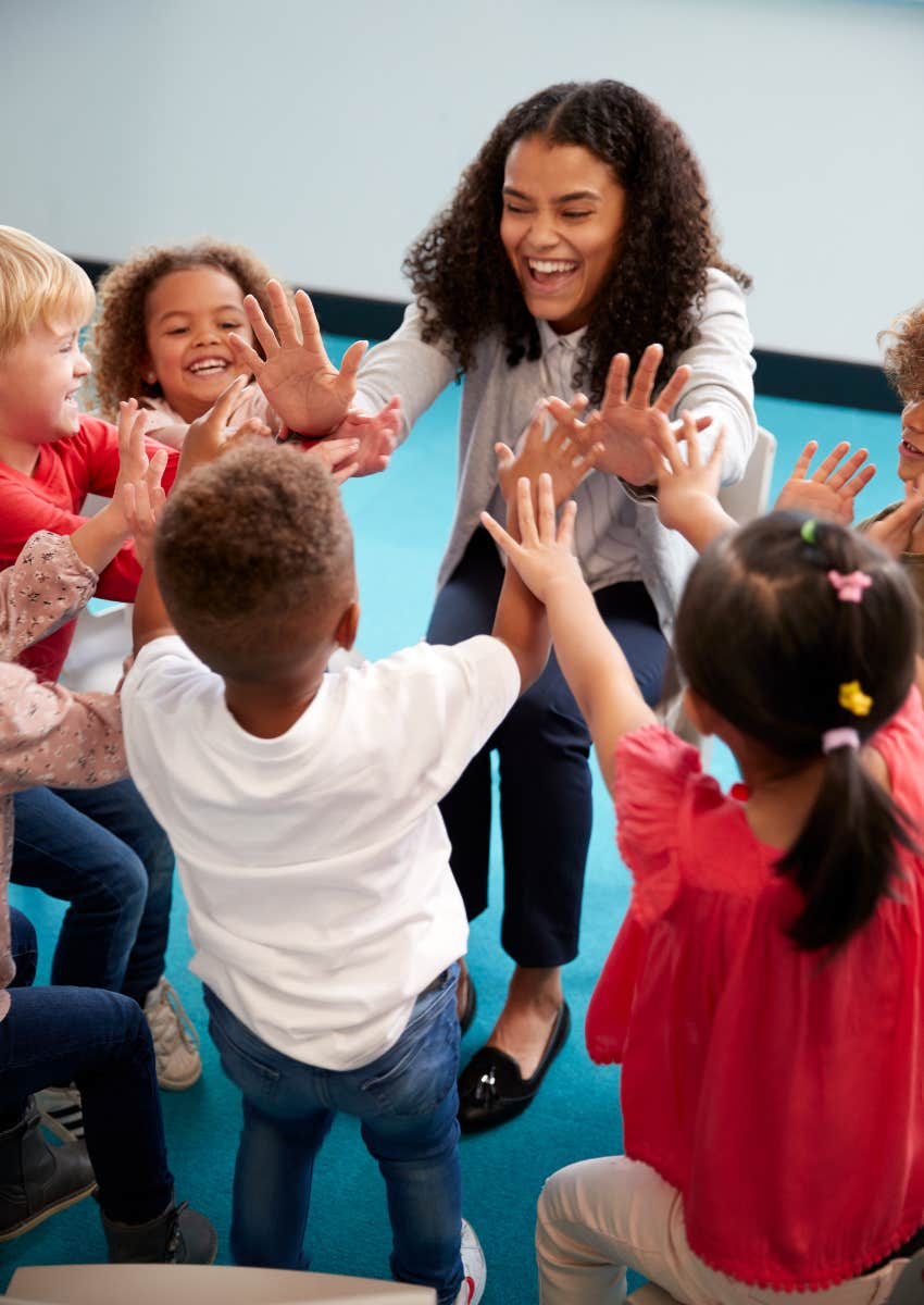 children enjoying classroom community at school