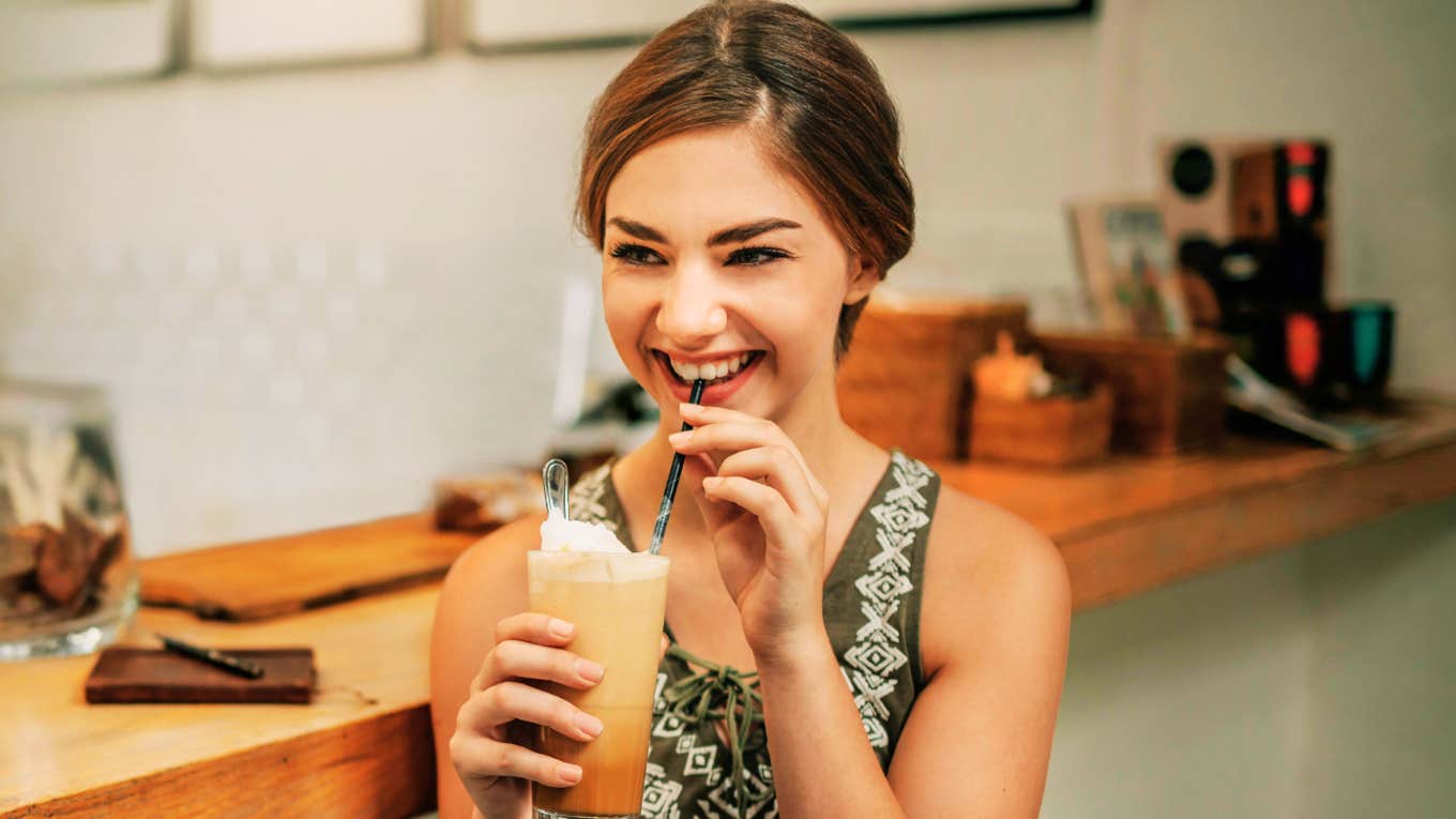 Woman with exceptionally rare level of charm, in a conversation with a man. 