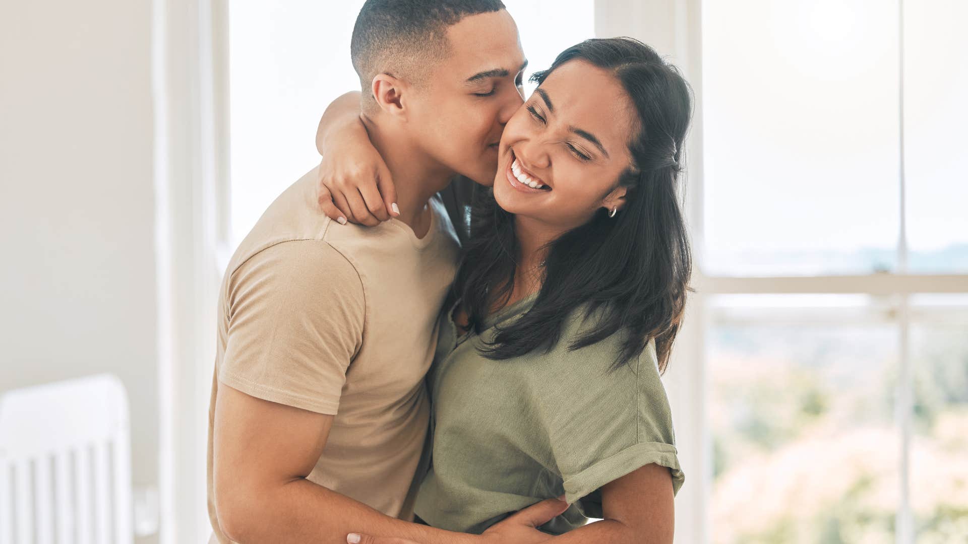 man who is more loving and kind giving wife a hug