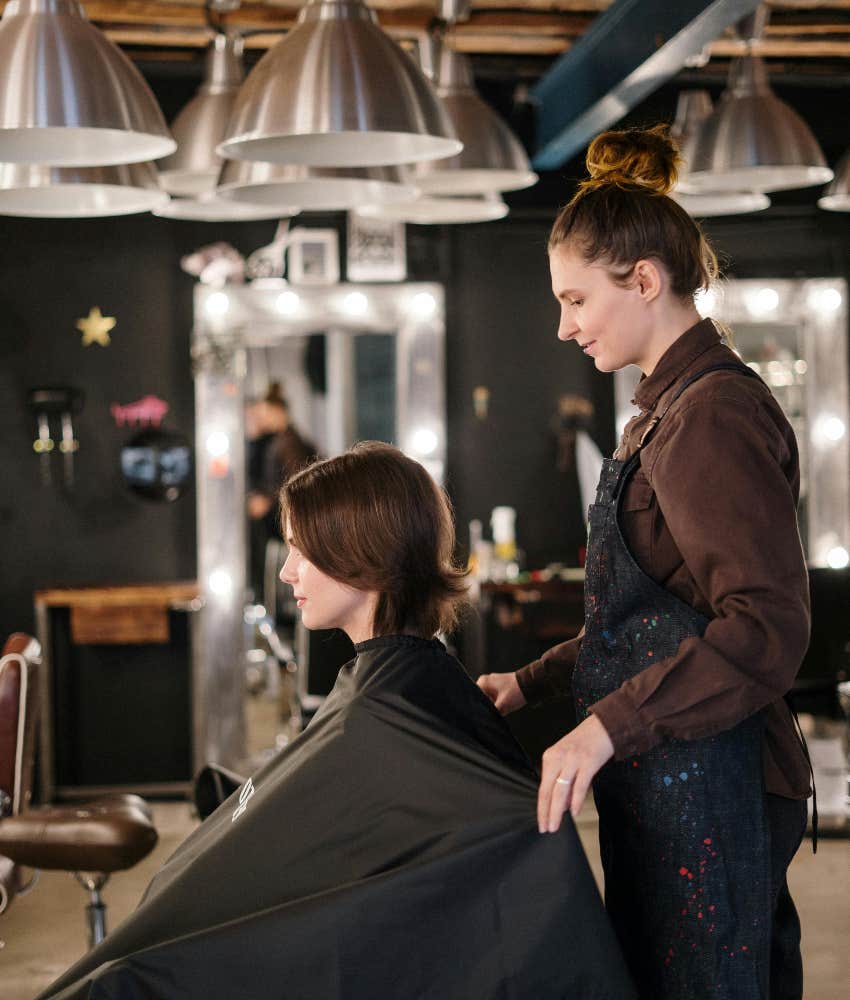 woman getting a hair cut