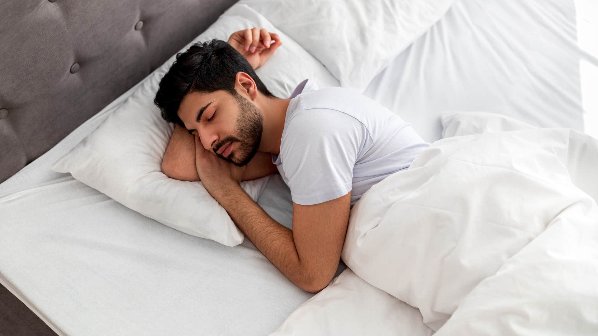 man who is having a dream that he is in his birthday suit in public