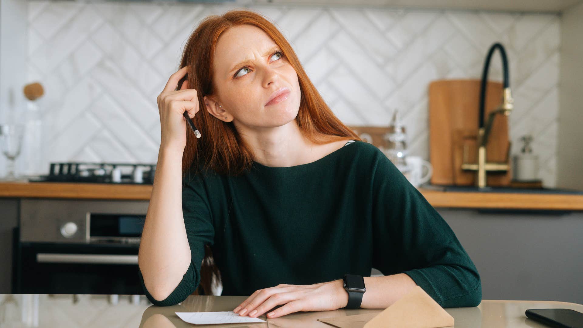 woman preparing to mail out Christmas cards