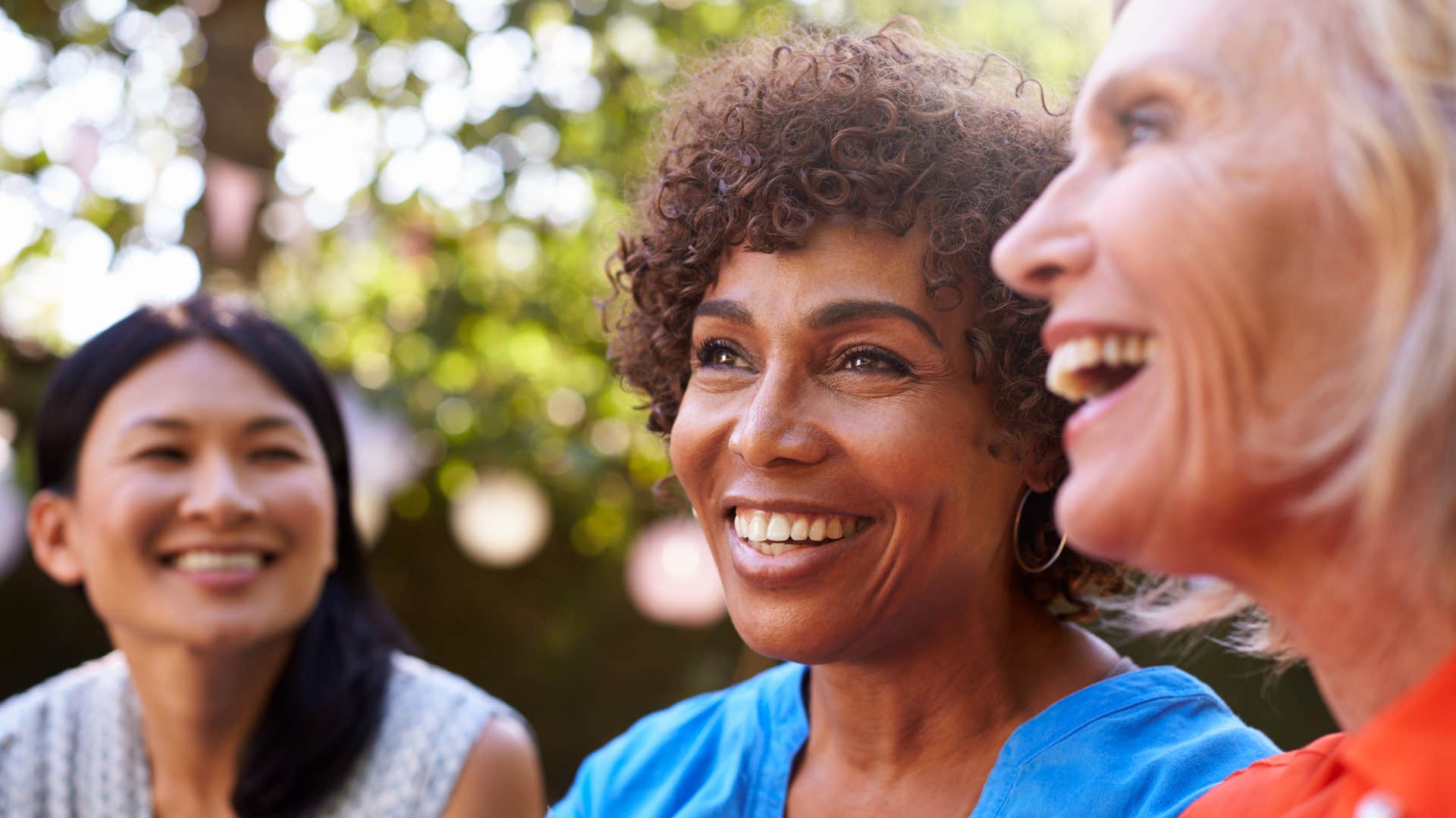 Three positive people feel lighter together