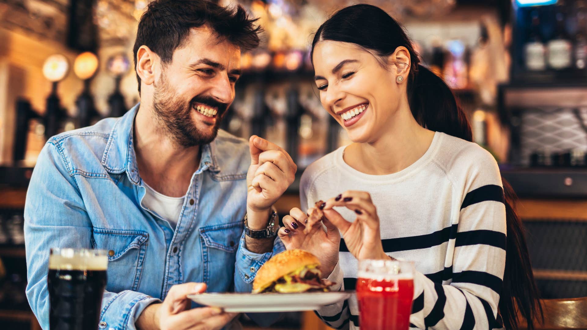 Couple eating and buying processed and fast foods.
