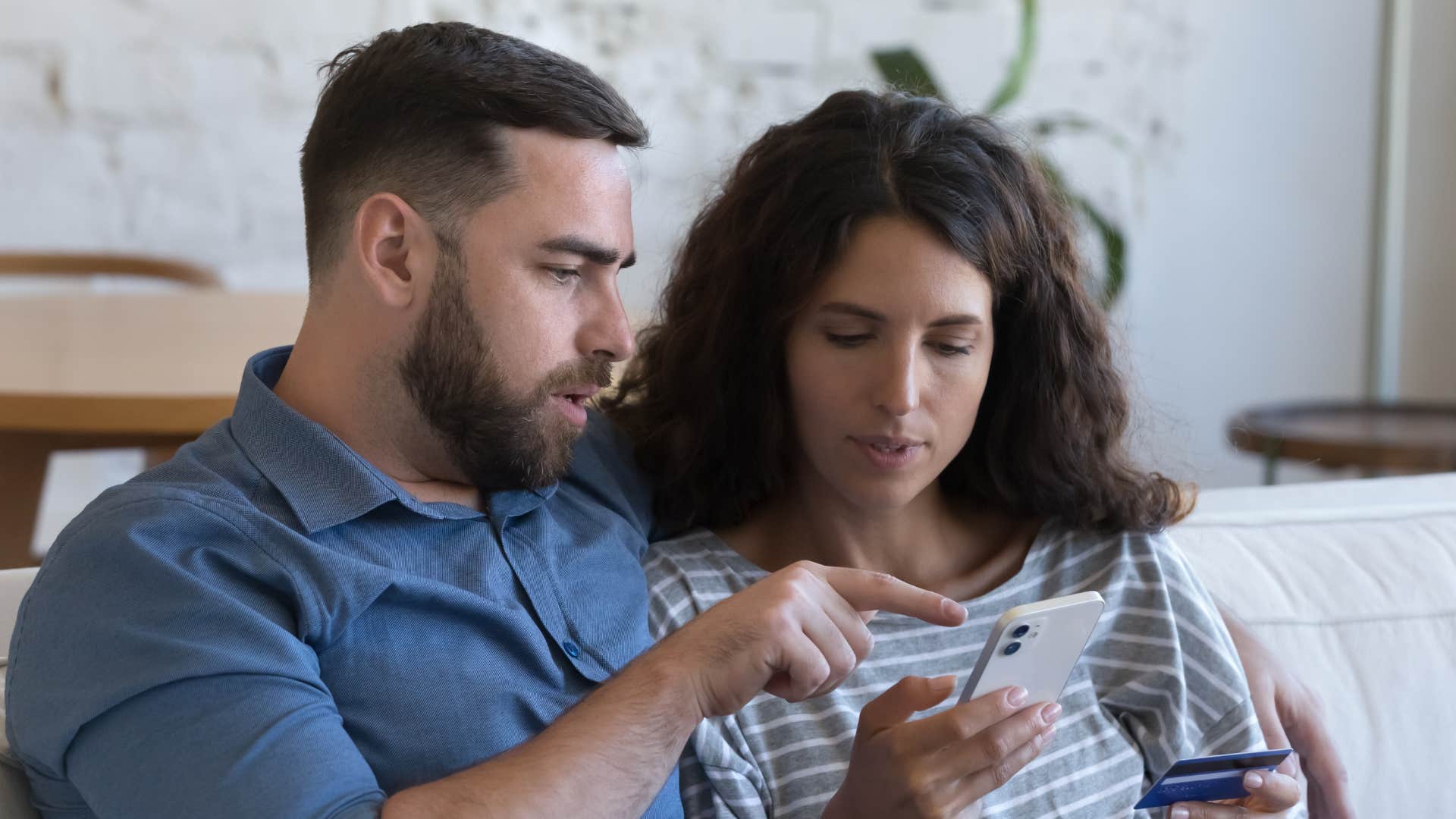 a husband is surprised that they have money left over despite the wife knowing already because she has been rounding things up