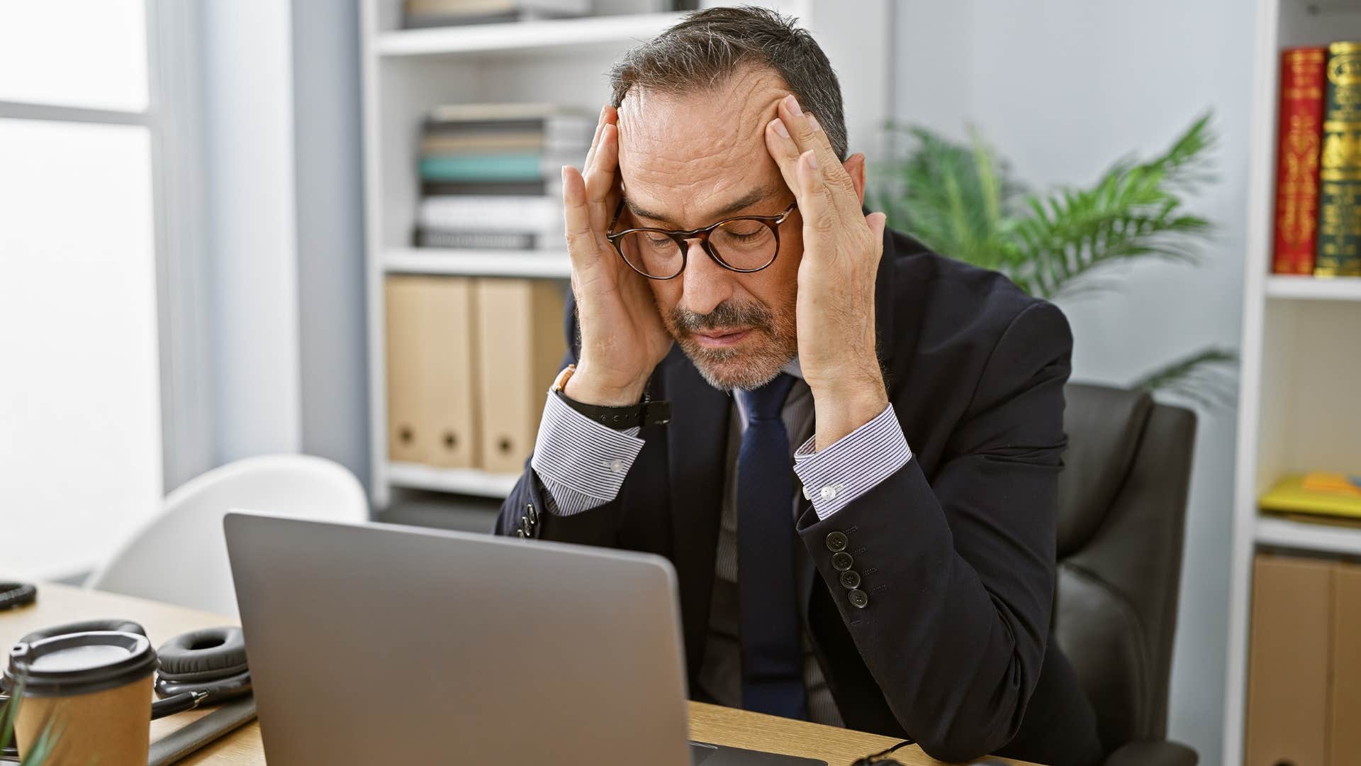 Man making excuses for technology usage at work.