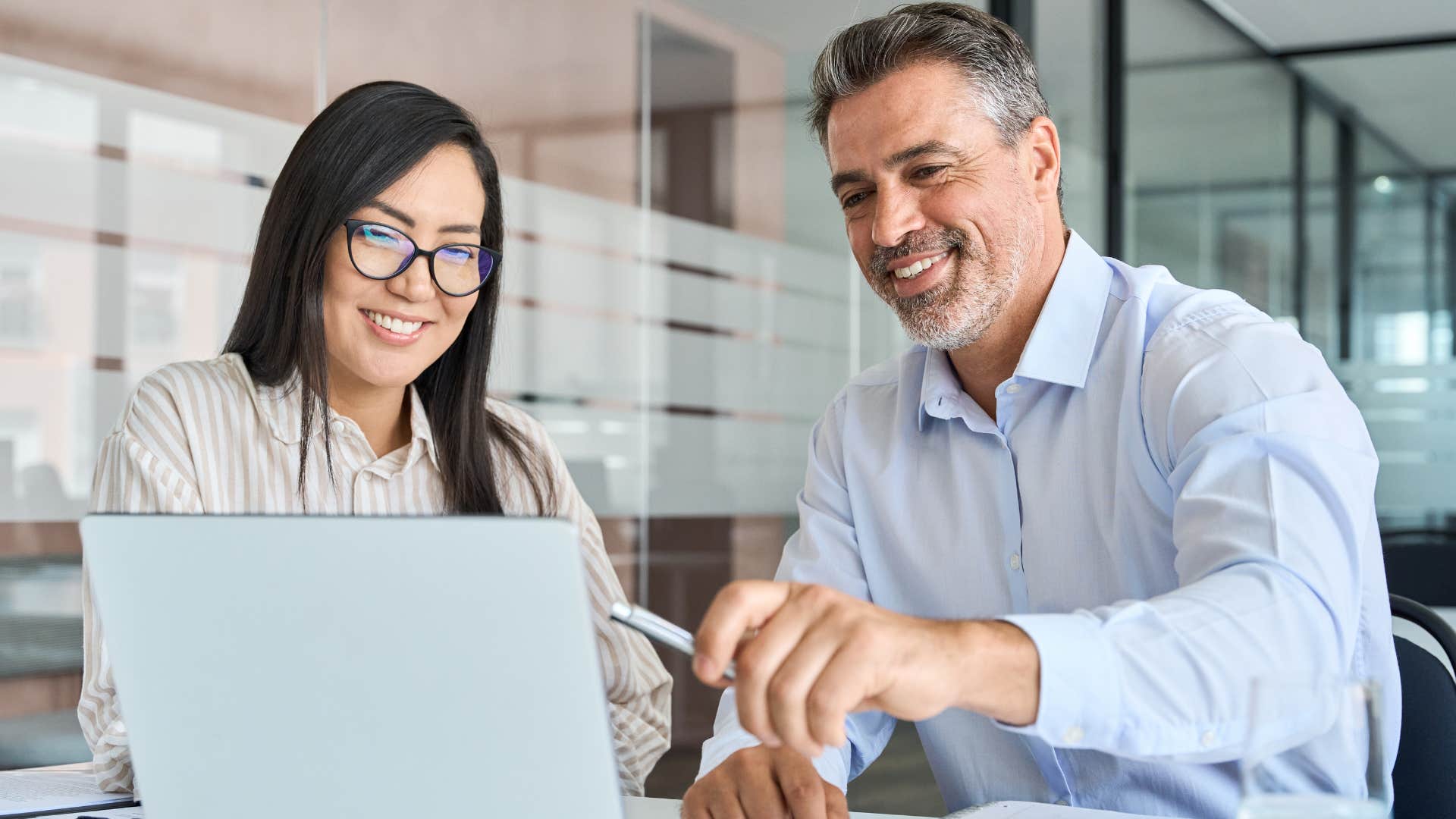 Man using corporate jargon with a co-worker.