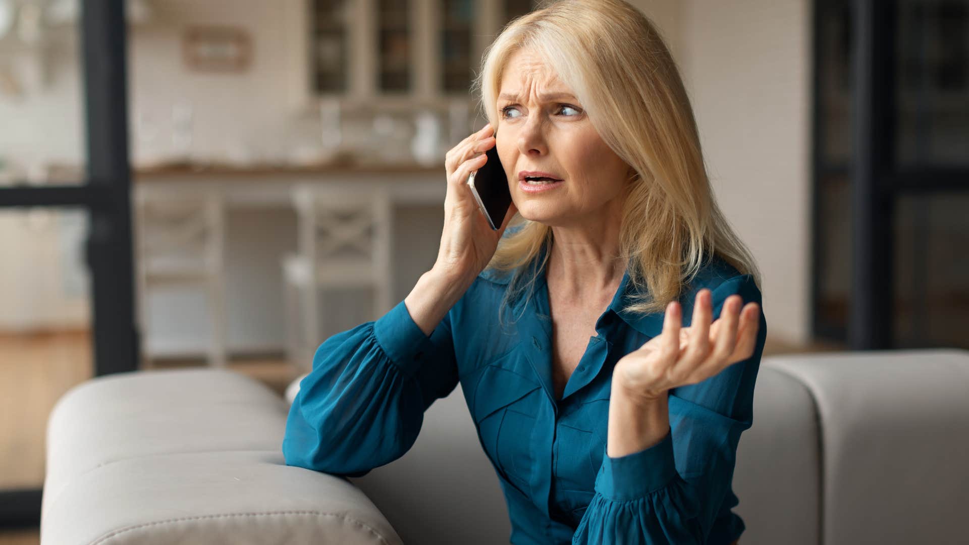 Woman who's never saying "thank you" talking on the phone.