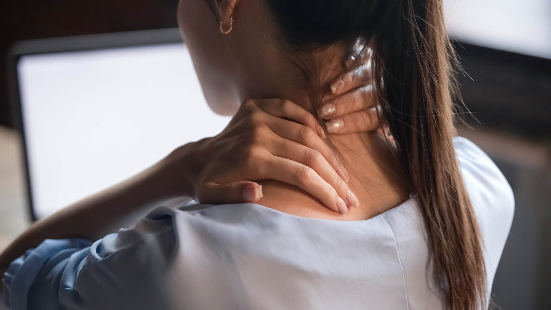 woman who thinks she is more chill than she actually is with muscle tension