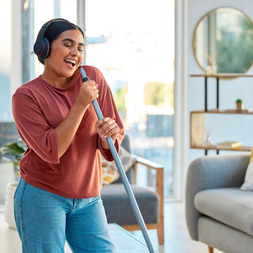 woman with the habit of getting a theme song that makes her life better every year