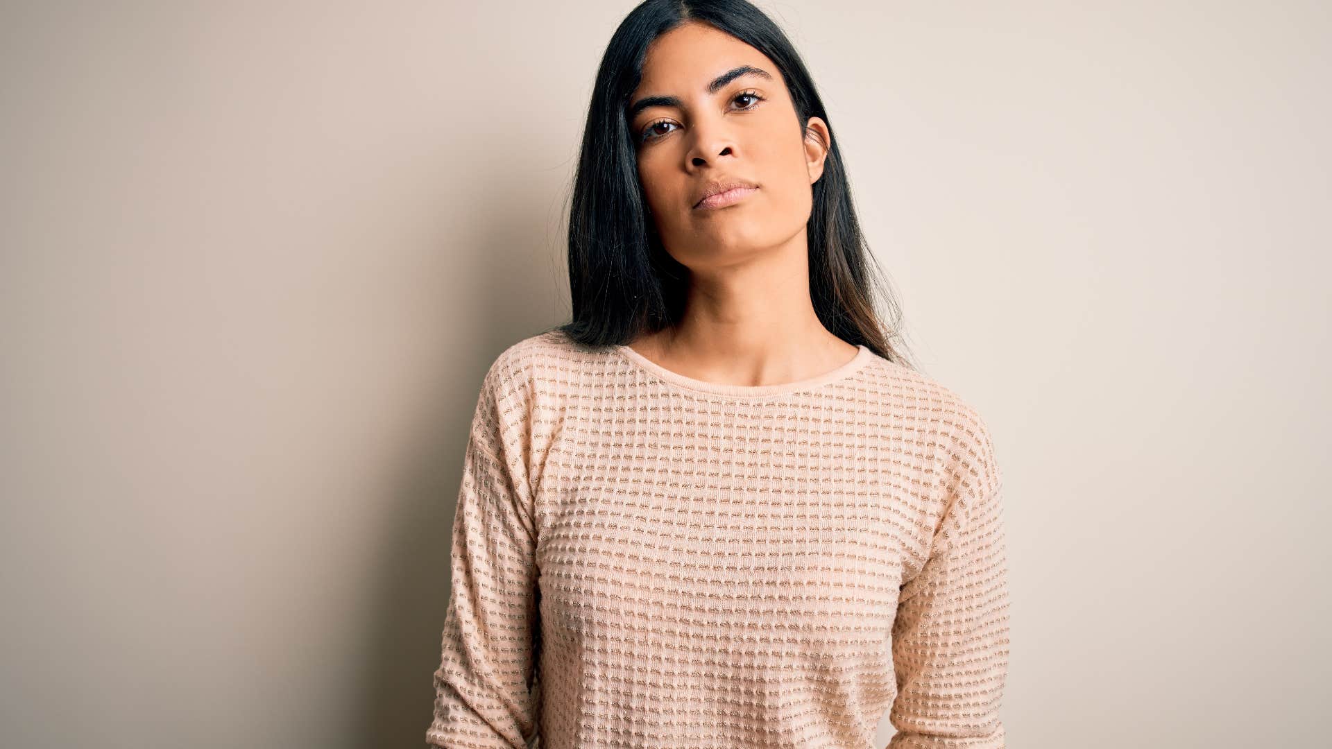 serious woman feeling mad after making assumptions