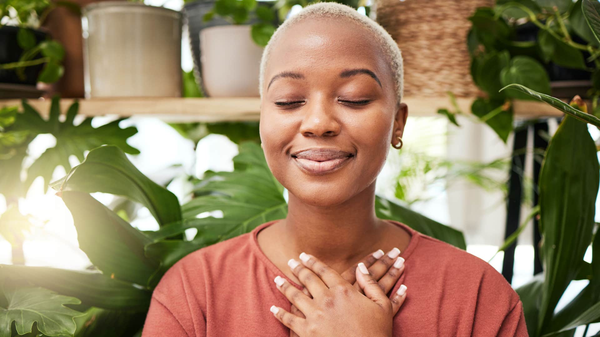 Person meditates to wake up happier