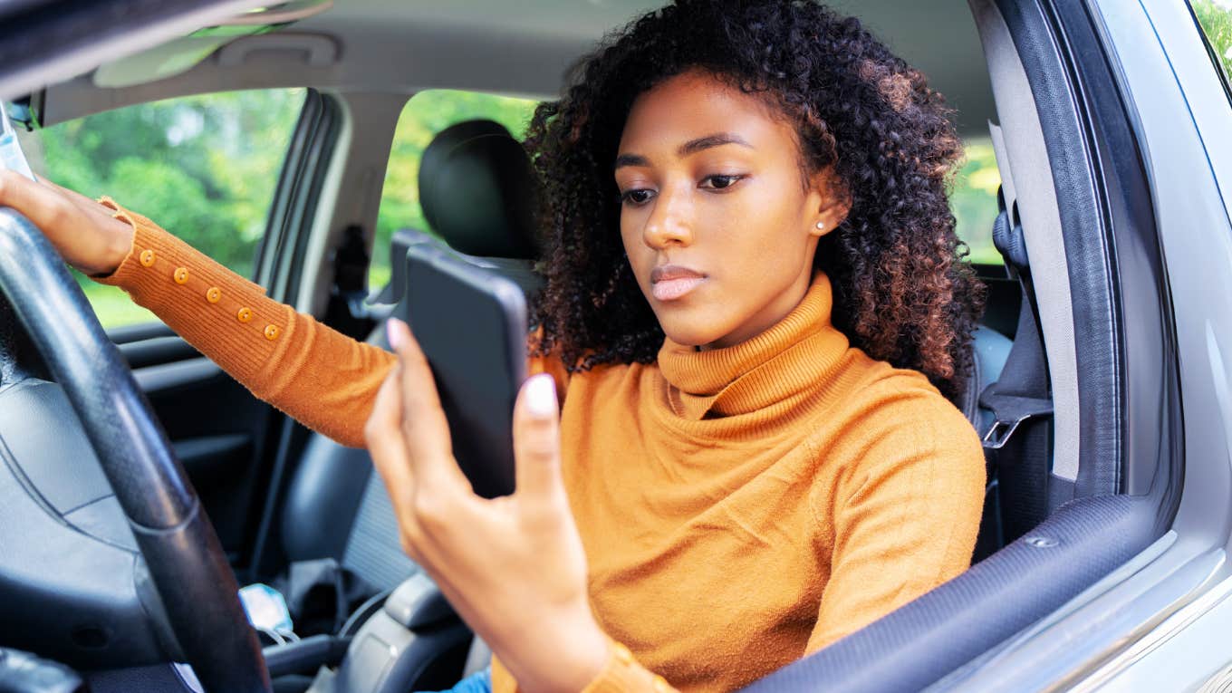 Person distracted on their phone. 