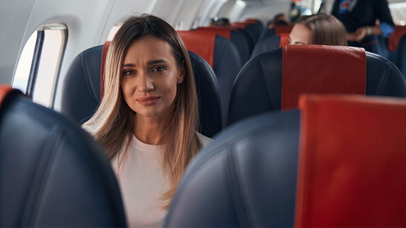 woman sitting highly coveted seat plane worst