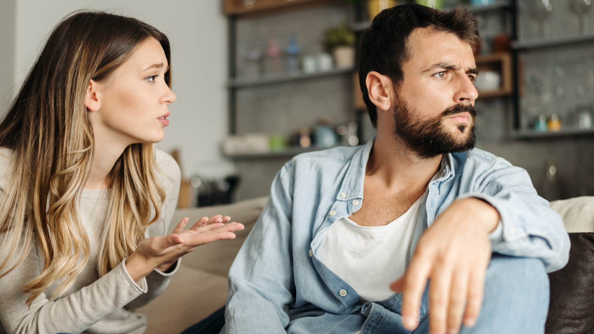 disrespectful husband turned away from his upset wife