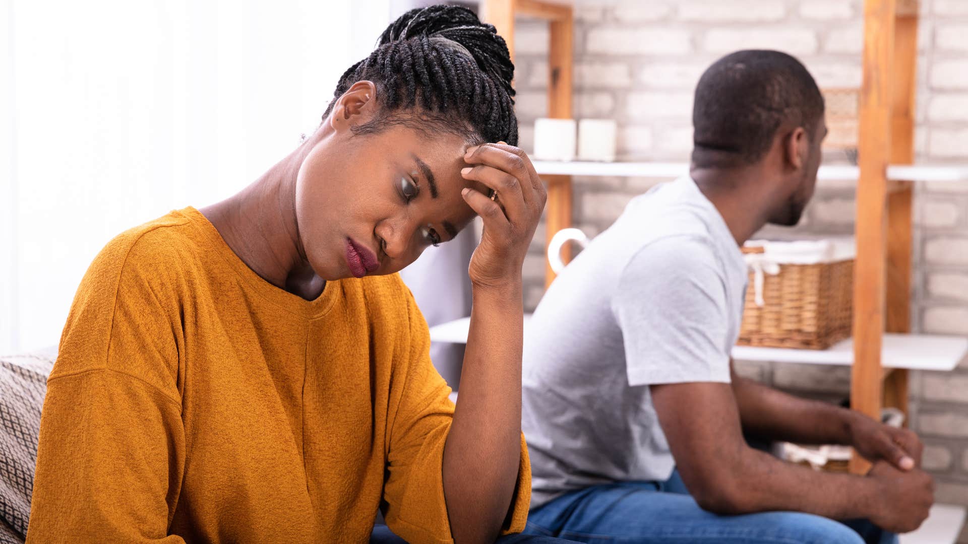 woman turned away from husband avoiding contact