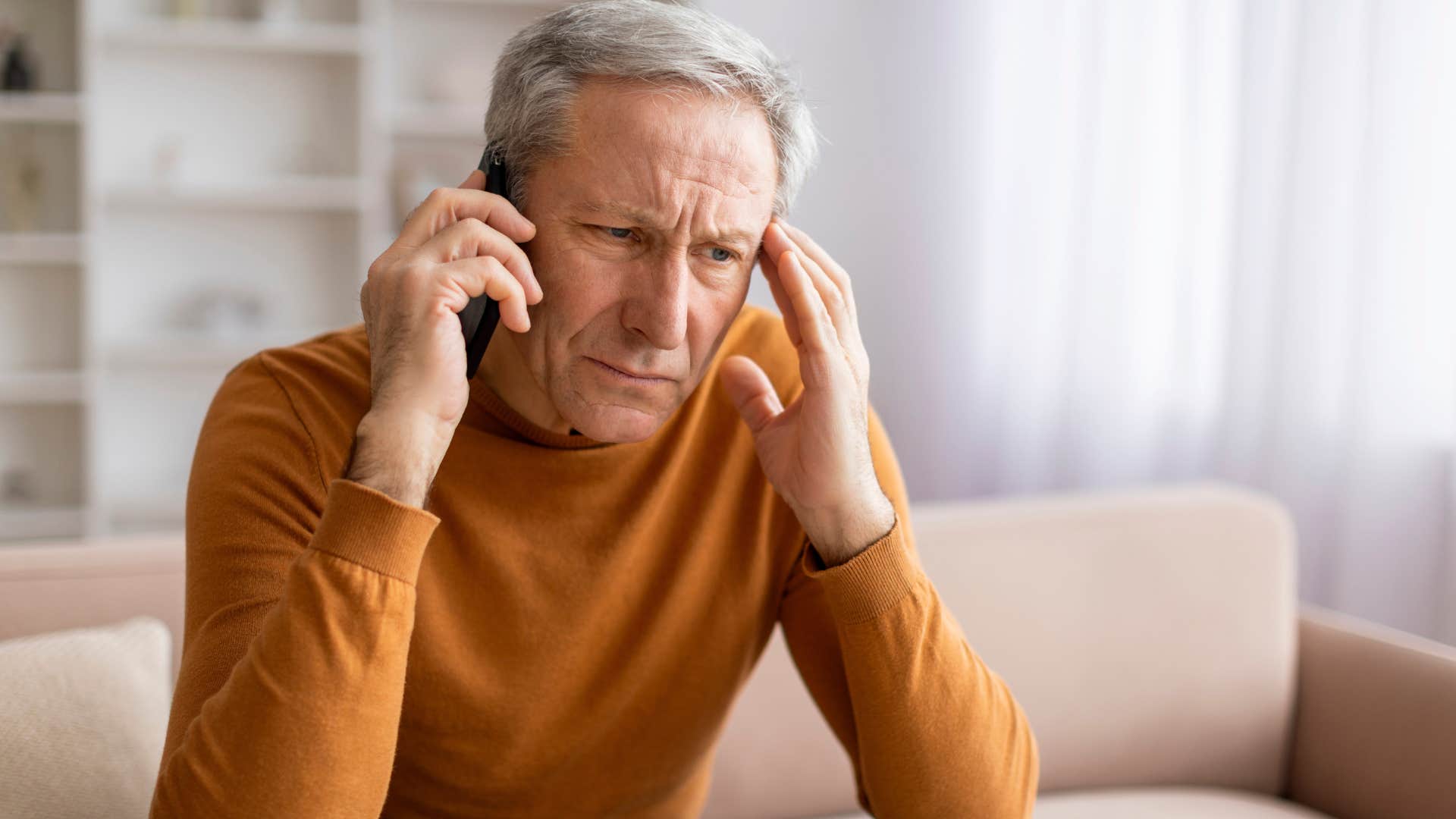 Man saying "she always wants to talk about her feelings" on the phone.