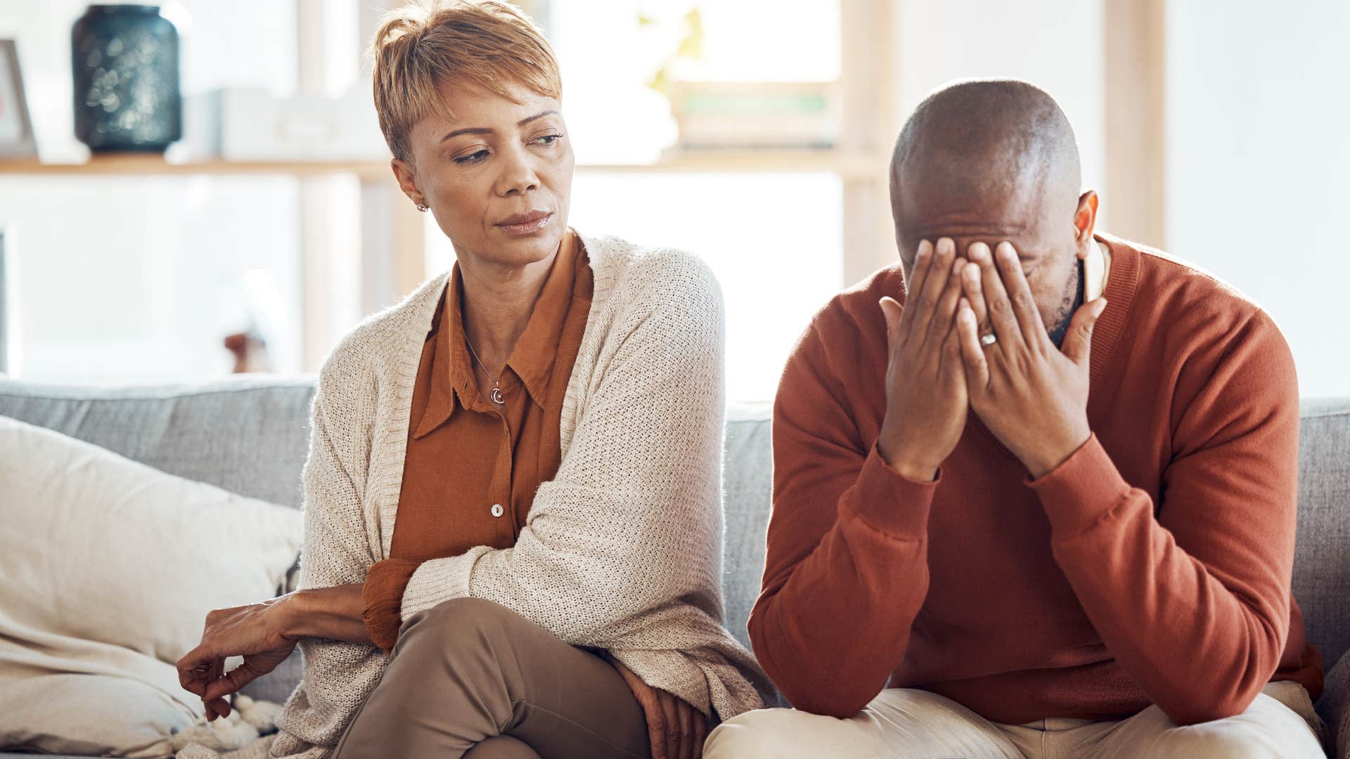 Man thinking "she's always nagging me" next to his wife.